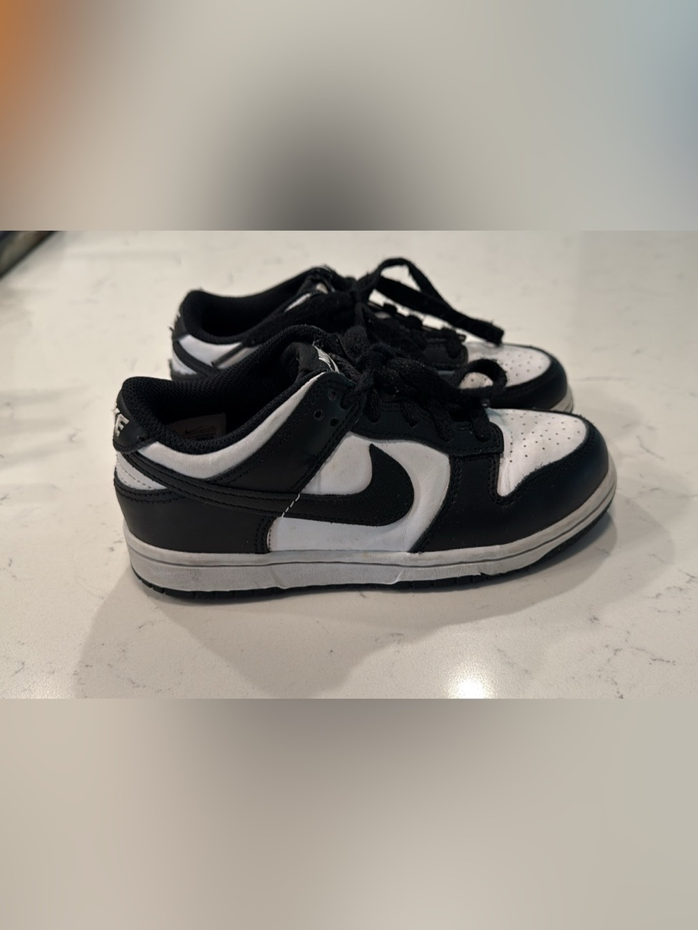Nike Kids Black and White Low-Top Sneakers with Swoosh